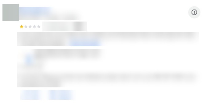 A one-star review in the Google Business Profile reviews list, with the round report icon in the top right