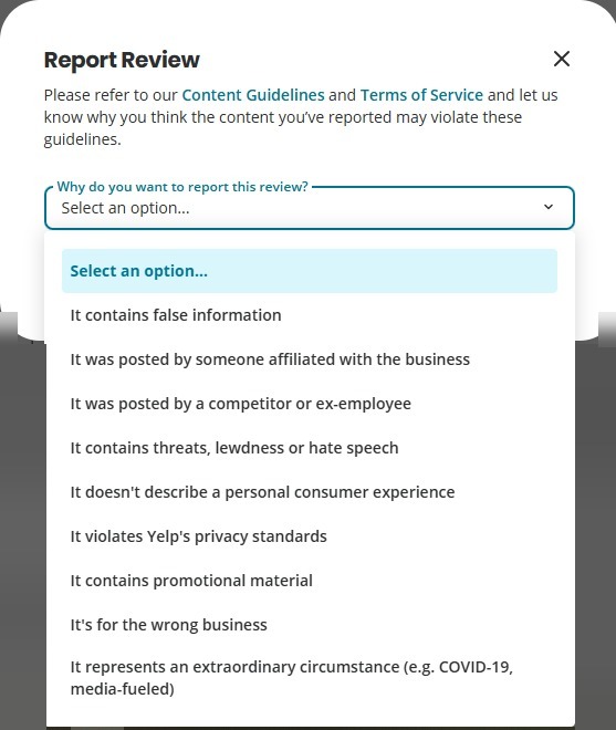 Yelp's Report Review form with its list of reasons, including false information, competitor or ex-employee, and privacy standards